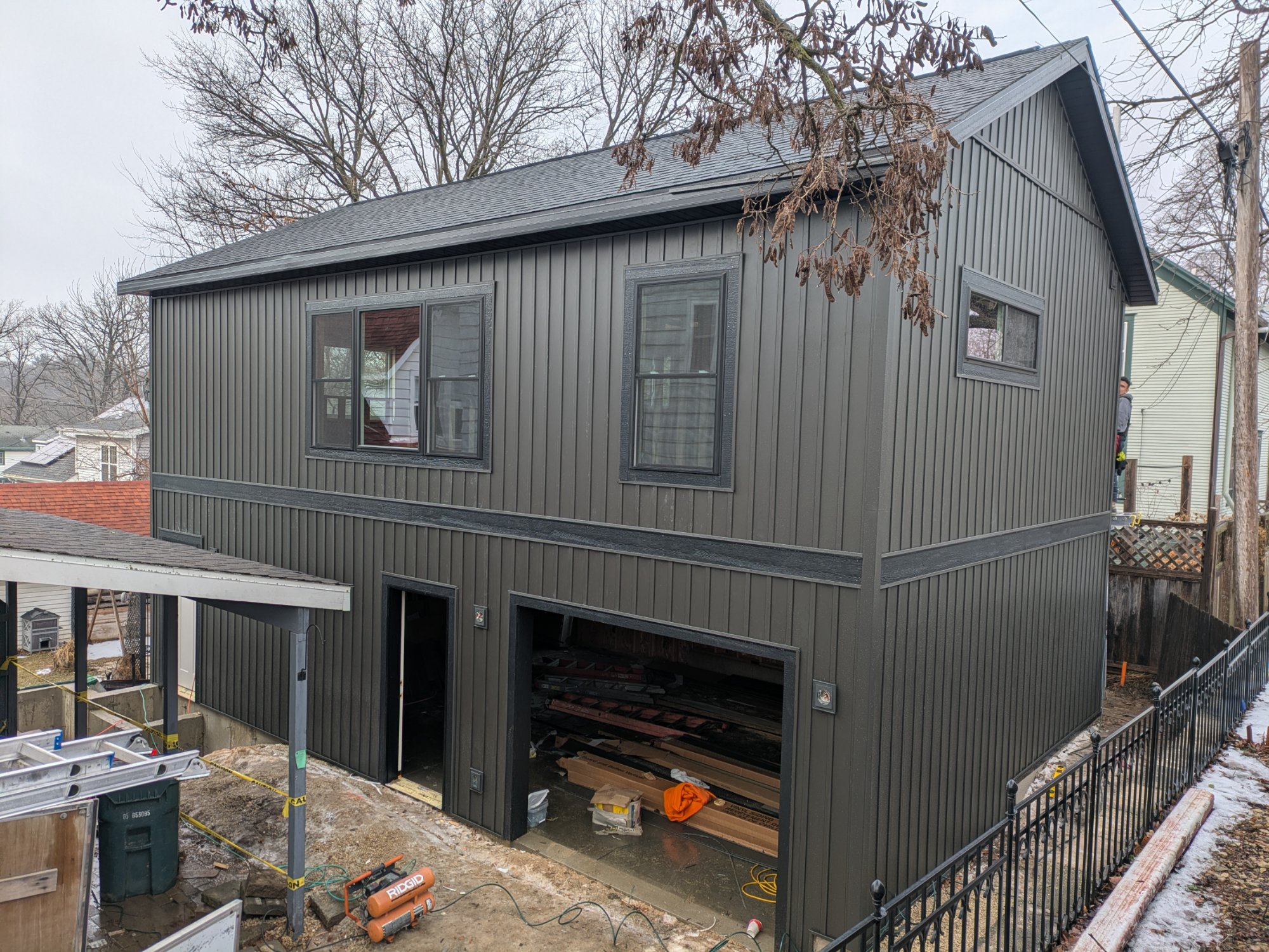 Two-story garage ADU exterior — dark board and batten siding, Vilas Neighborhood Madison WI